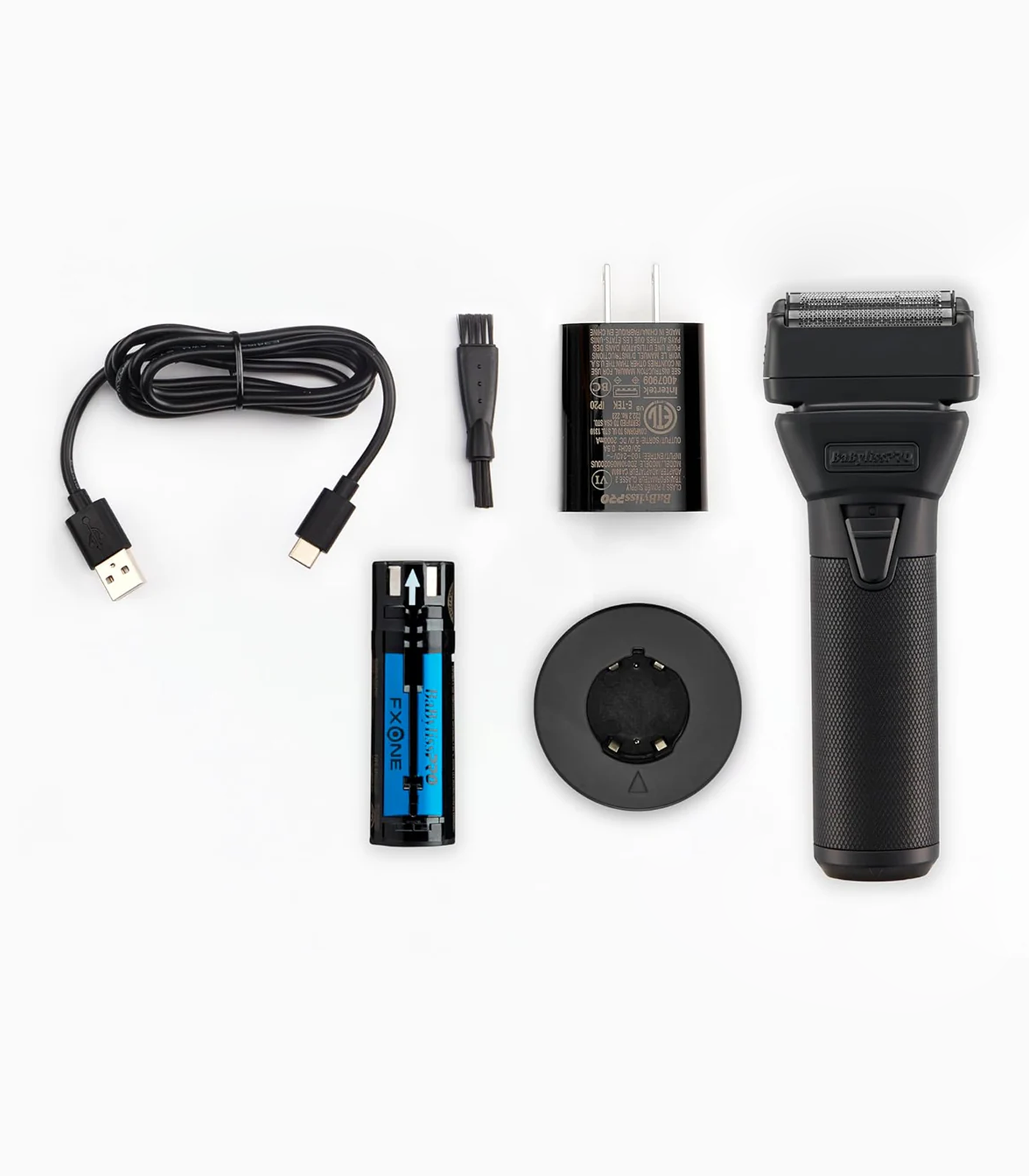 Black electric shaver with USB cable, battery, and charging adapter on a white background