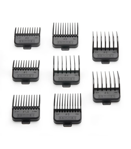 Set of black hair clipper combs on a white background