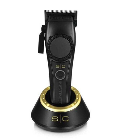 Gold hair trimmer with 'Saber' branding on a white background
