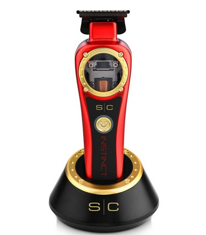 Red and black grooming tool with gold accents on a white background