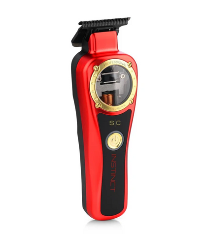 Red and black hair trimmer with gold accents on a white background
